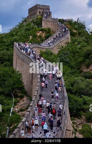 Lots of domestic visitors hiking the Great Wall from Badaling, a simple day trip from Beijing Stock Photo