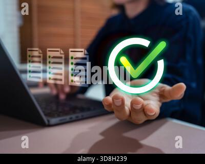 Digital checklist and approval concept showing verified documents and glowing green checkmark icon. Ideal for illustrating certificate validation, doc Stock Photo