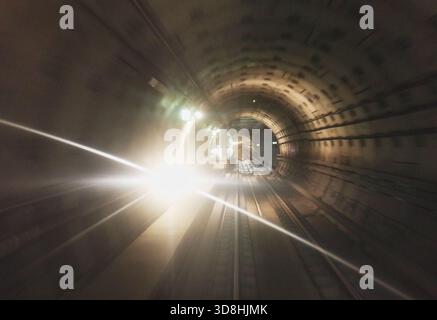 Blurred motion in metro tunnel. Copenhagen metro Stock Photo