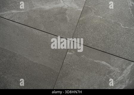Gray Stone Floor Tiles With Precise Grout Lines And Natural Texture For Modern Interior Design Stock Photo