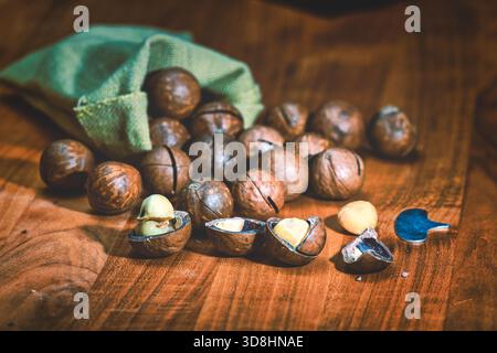 Close-up of macadamia nuts on wooden table Stock Photo