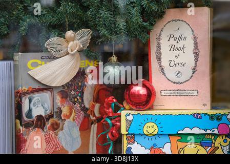 christmas decorations in used book shop window display, norfolk, england Stock Photo