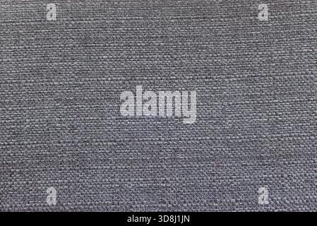 Close up shot of a rough and detailed woven canvas surface. Texture, background. Stock Photo