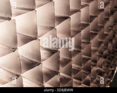 Honeycomb grid creating a pattern for controlling light direction, showing the fabric texture and structure of a studio softbox light modifier, ideal Stock Photo