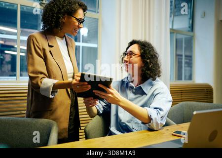 Engaging Collaborative Business Meeting in a Contemporary Office Environment Setting Stock Photo