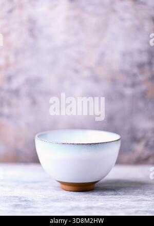 Traditional, handcrafted ceramic on wooden background. Soft focus. Copy space. Stock Photo