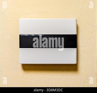 New plastic electrical panel on the wall Stock Photo