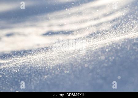 Surface of snow with blizzard on cold and sunny winter day in Finnish nature, Europe Stock Photo