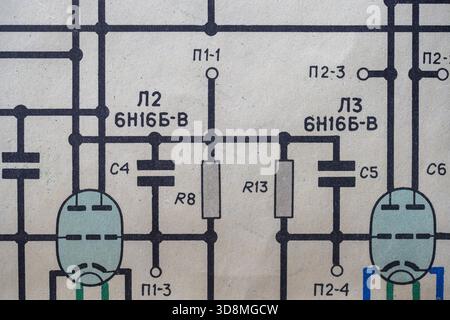 Old radio circuit printed on vintage paper electricity diagram as background for education, electricity industries and repair. Electric radio scheme f Stock Photo