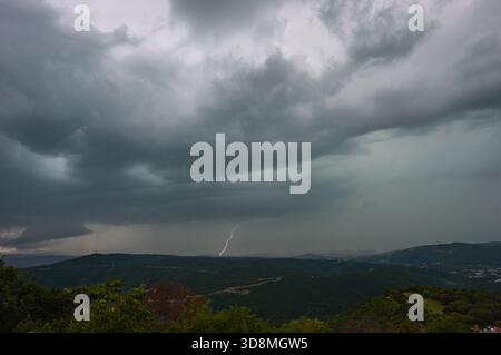 Lightning from severe thunderstorm over the Adriatic coast near Trieste, Italy and Koper, Slovenia Stock Photo