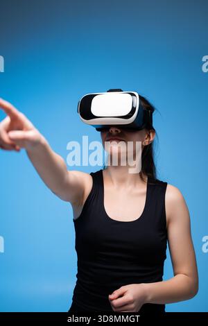 Engineer Navigating 3D Architectural Model Using VR Controls for Precise Spatial Examination Stock Photo