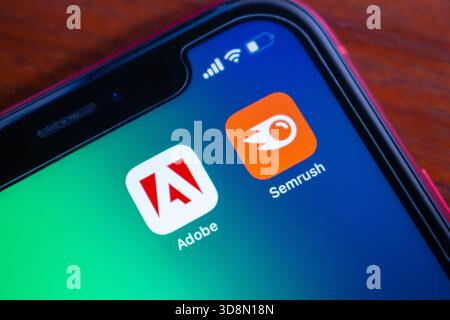 Quito, ECUADOR - Dec 1 2025 :Close-up of Adobe and Semrush icons are seen in an iPhone screen. Stock Photo