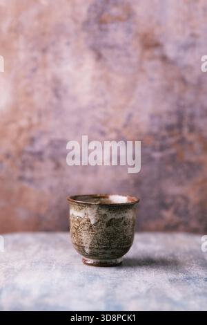 Traditional, handcrafted ceramic on wooden background. Soft focus. Copy space. Stock Photo