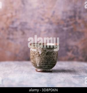 Traditional, handcrafted ceramic on wooden background. Soft focus. Copy space. Stock Photo