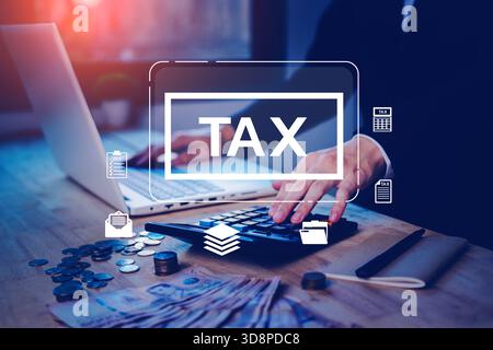 Businessman calculating tax with money, calculator and laptop on desk. Concept for financial planning, tax return, accounting, finance management, inc Stock Photo