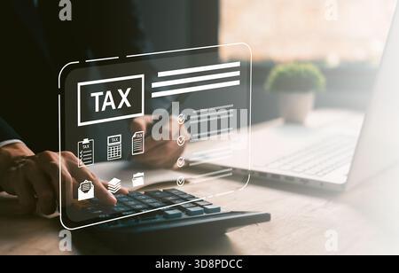 Close-up of hand using calculator with digital tax checklist interface, suitable for financial reports, income tax return, tax preparation, and online Stock Photo