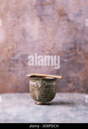 Traditional, handcrafted ceramic on wooden background. Soft focus. Copy space. Stock Photo