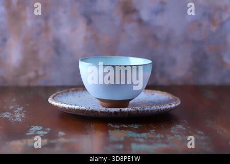 Traditional, handcrafted ceramic on wooden background. Soft focus. Copy space. Stock Photo