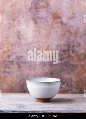 Traditional, handcrafted ceramic on wooden background. Soft focus. Copy space. Stock Photo