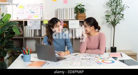Friendly UX UI Designers Collaborating on Project Stock Photo