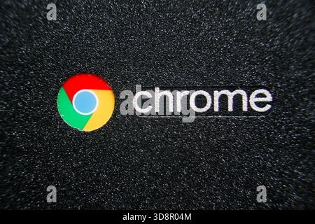 close up of google chrome logo on cover laptop Stock Photo