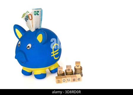 Saving for a New House, Piggy Bank with Euro Symbol, Banknotes and Coins Stock Photo