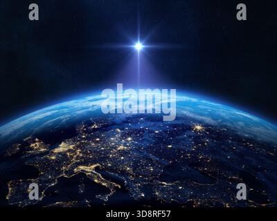 Planet Earth in outer space. Star of Bethlehem. The star shines over the manger of Christmas of Jesus Christ. Star of Jesus. Moravian Star. Europe at Stock Photo