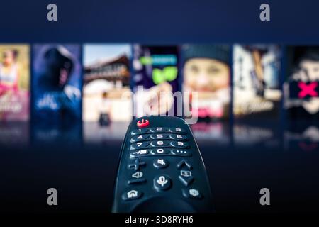 Stream on tv. Watch movie home from online vod. Video on demand service in television. Streaming content on screen. Stock Photo