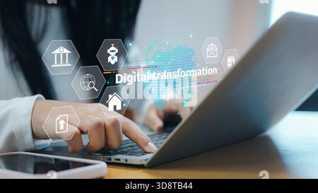 Woman using laptop with digital transformation interface, modern technology icons, innovation, data process, online system development, and future bus Stock Photo