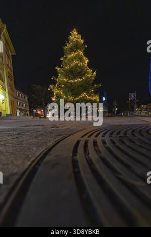 A Christmas tree shot from below with lights at night, Aidlingen, Boeblingen district, Germany Stock Photo