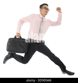 Full body young Asian businessman running or jumping up with a briefcase, isolated on white background Stock Photo