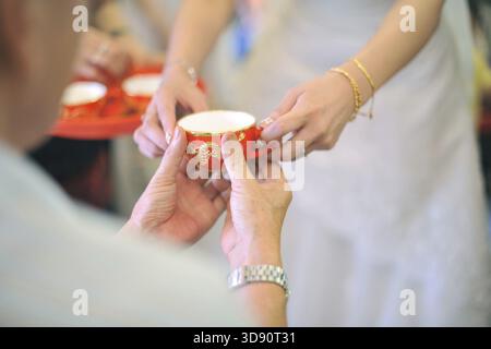 Chinese wedding tea ceremony serving to elders Stock Photo