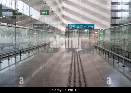 Singapore, Singapore - November 02, 2024: Changi Singapore airport features sleek glass walls, modern architecture, and clear directional signage, cre Stock Photo
