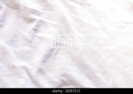 White cotton fabric showing a crumpled texture and soft folds Stock Photo