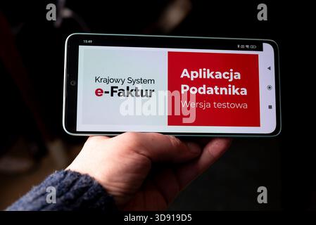 Lublin, Poland 24 November 2025 Mandatory B2B electronic invoicing system ('KSeF'), or ('Krajowy System e-Faktur') webpage on a mobile phone Stock Photo