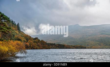 Stormy autumn view of Muckross Lake, Killarney National Park, Co. Kerry, Ireland, mountains, forest, textured water Stock Photo