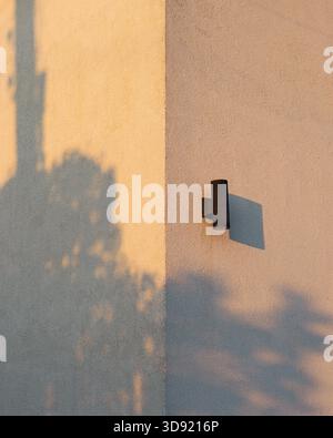 Shadows on the corner of a house wall, sunlight Stock Photo
