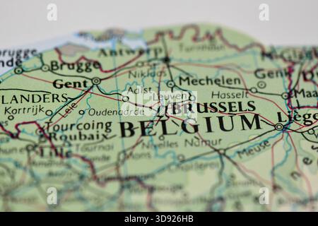 A close-up view of a detailed road and political map, focused on the country of Belgium and its capital, Brussels. Stock Photo