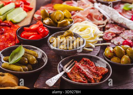 Appertiter platter with assorted meat and cheese, snacks and vegetables Stock Photo