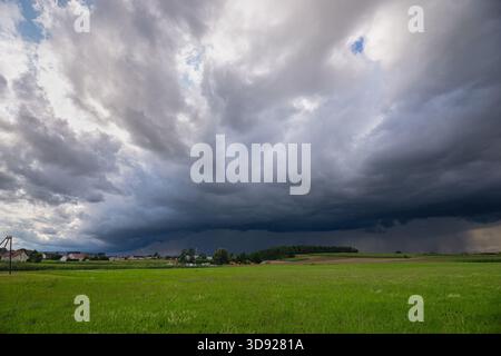 Dramatic view of an approaching thunderstorm over the Bavarian countryside south of Ingolstadt, Germany Stock Photo