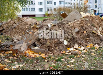 Sand and construction waste from home renovations. Waste sorting, hazardous waste disposal at the construction site, and waste recycling. Stock Photo