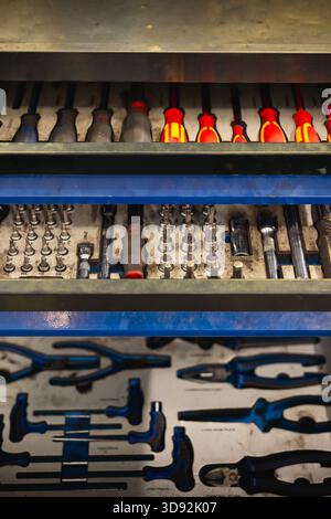 Large collection of sockets, ratchets, and accessories in a case. Professional tools for mechanical workshop and repair. Stock Photo