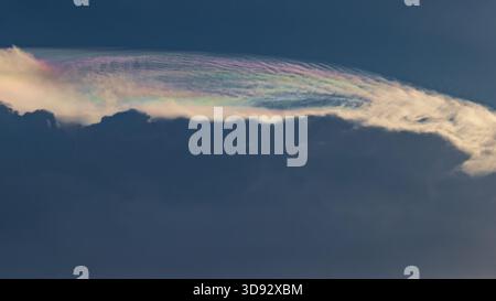 Iridescent cloud formations late afternoon Stock Photo