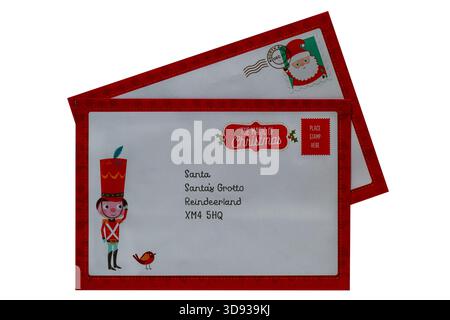 envelopes with top one addressed to Santa Santas Grotto Reindeerland  part of Letter to and from Santa Set isolated on white background Stock Photo