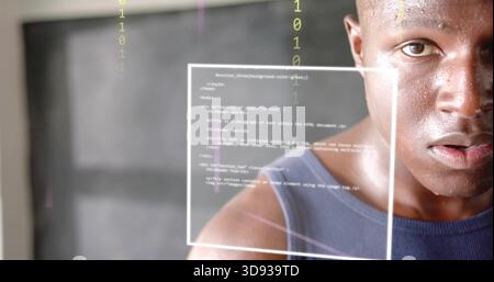 Studying developer in dark blue sleeveless shirt viewing code UI panel in studio with binary digits Stock Photo