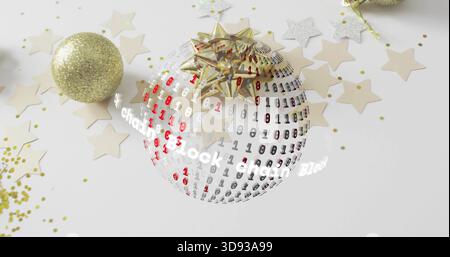 Showing orb wearing gold bow with binary digits on white tabletop, gold glitter balls and confetti Stock Photo