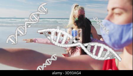 Stretching four women doing guided stretch on sandy shore, wearing cloth masks, tops, DNA helices Stock Photo