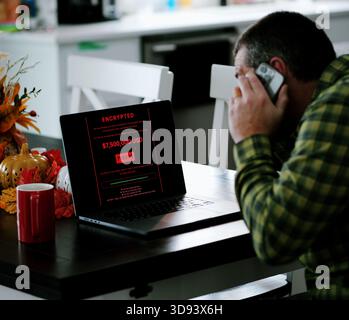 Middle Aged Male Executive Working From Home Falls for Spear Phishing Email Resulting in Ransomware Encrypting Files on Corporate Network Concept Stock Photo