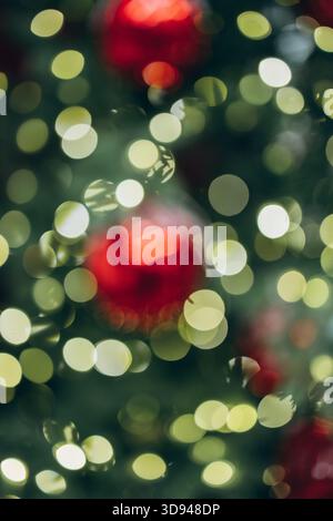 A soft, golden bokeh background created by out-of-focus festive lights, offering a warm and atmospheric holiday glow perfect for seasonal designs and Stock Photo