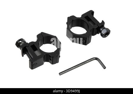 Black metal scope rings and Allen wrench isolated on a white background. Stock Photo